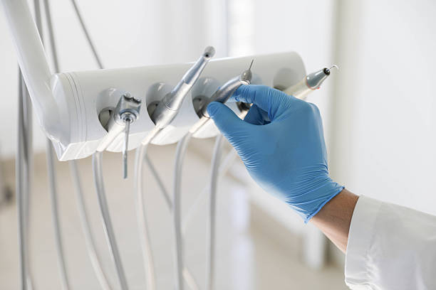 Professional Tooth Extraction technician working in Cornelius, NC